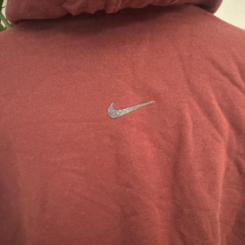 Nike Yoga Dri-FIT Luxe Cropped Hoodie in Mahogany